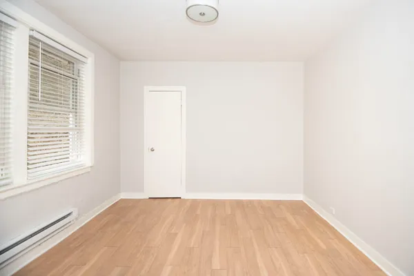 a view of a room that has a window in it