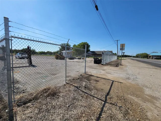 a view of a backyard of the house