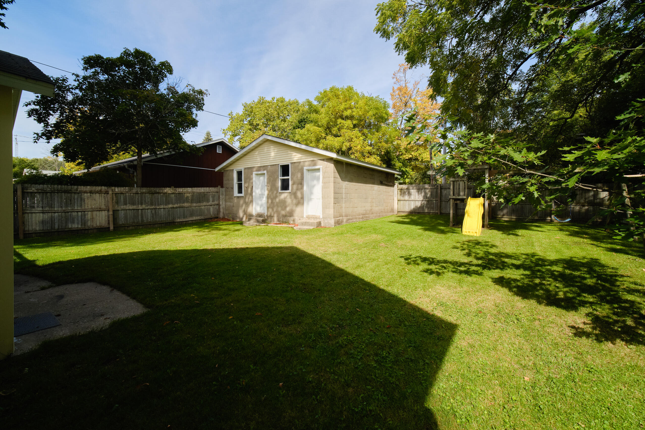 244 5th Street Manistee, MI 49660 - Photo 40 of 45 Completely fenced backyard