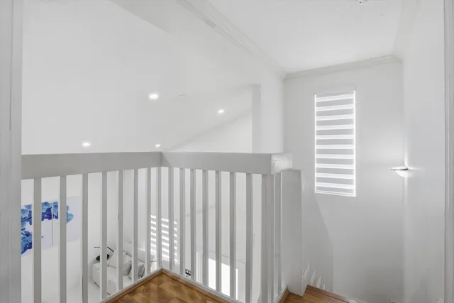 a view of hallway with stairs