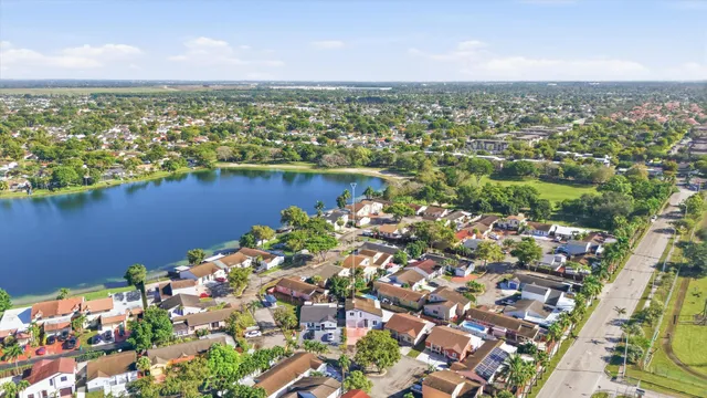 view of a lake with a city
