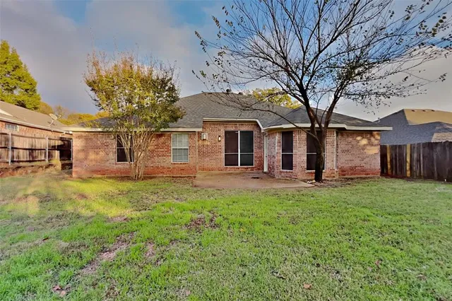 front view of a house with a big yard