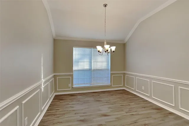 a view of a livingroom with wooden floor