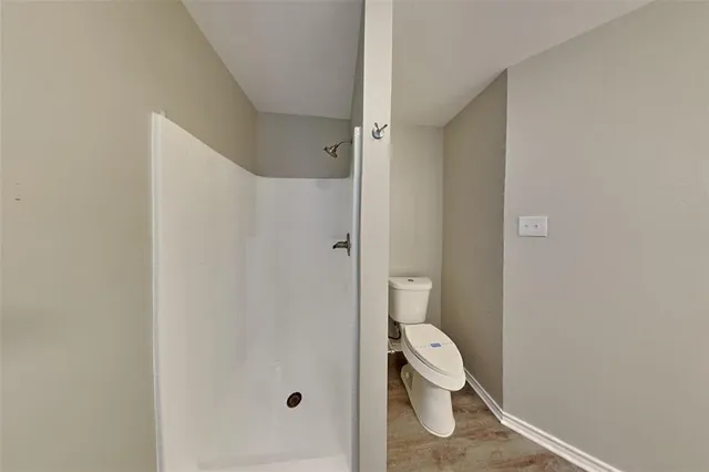 a bathroom with a toilet