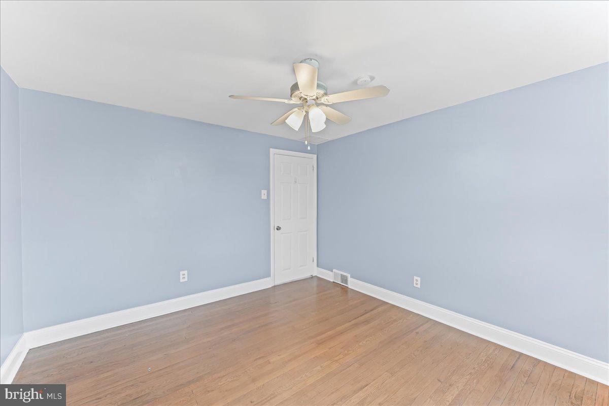 200 Fairview Road Springfield, PA 19064 - Photo 16 of 43 wooden floor in an empty room with a window