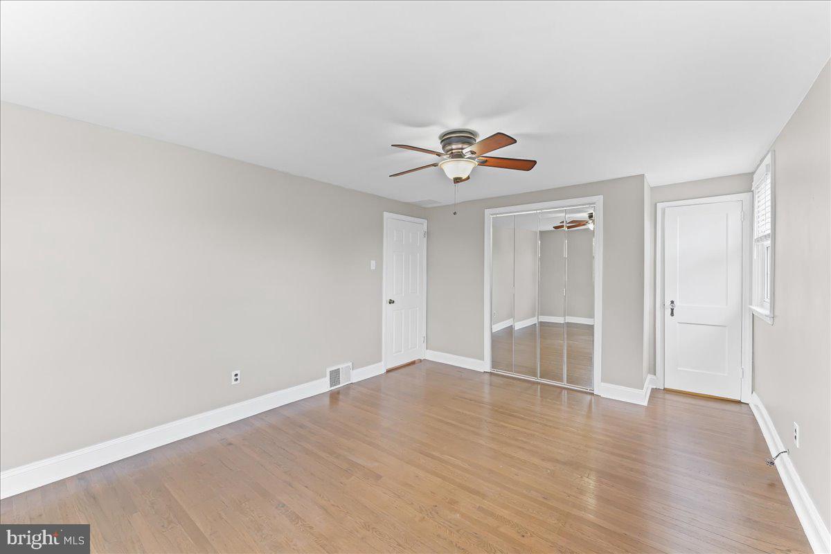 200 Fairview Road Springfield, PA 19064 - Photo 24 of 43 wooden floor in an empty room with a window