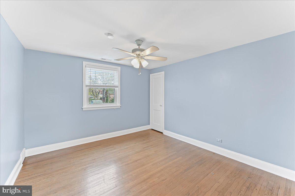 200 Fairview Road Springfield, PA 19064 - Photo 25 of 43 wooden floor in an empty room with a window