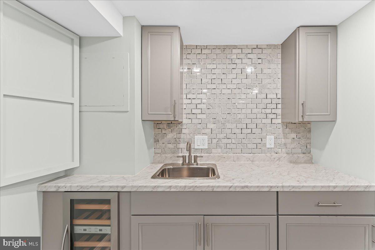 200 Fairview Road Springfield, PA 19064 - Photo 31 of 43 a kitchen with a sink and cabinets