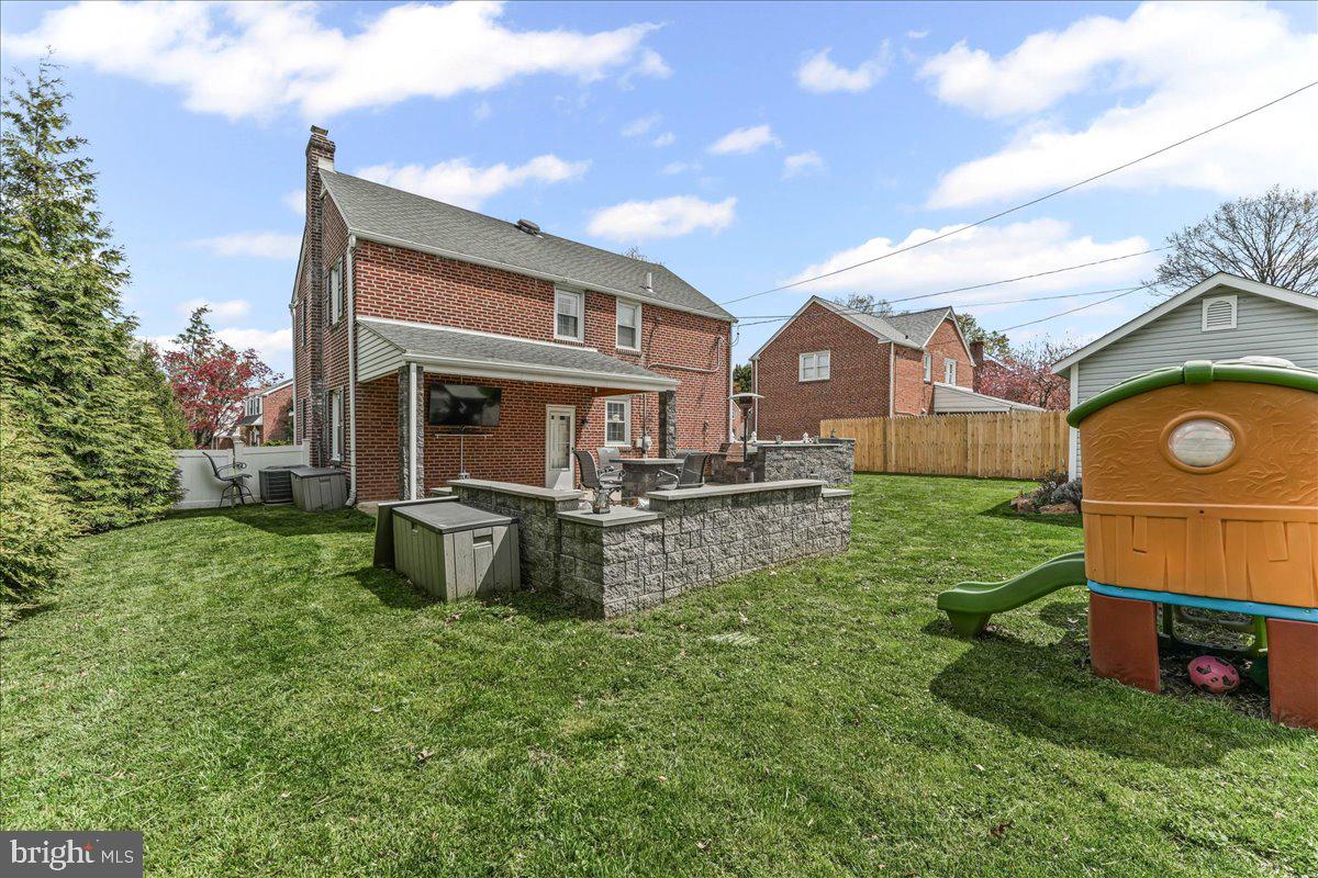 200 Fairview Road Springfield, PA 19064 - Photo 38 of 43 a backyard of a house with table and chairs