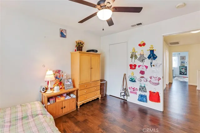 a room with toys and wooden floor