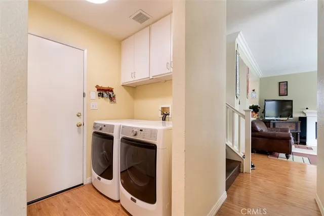 a view of living room washer and dryer
