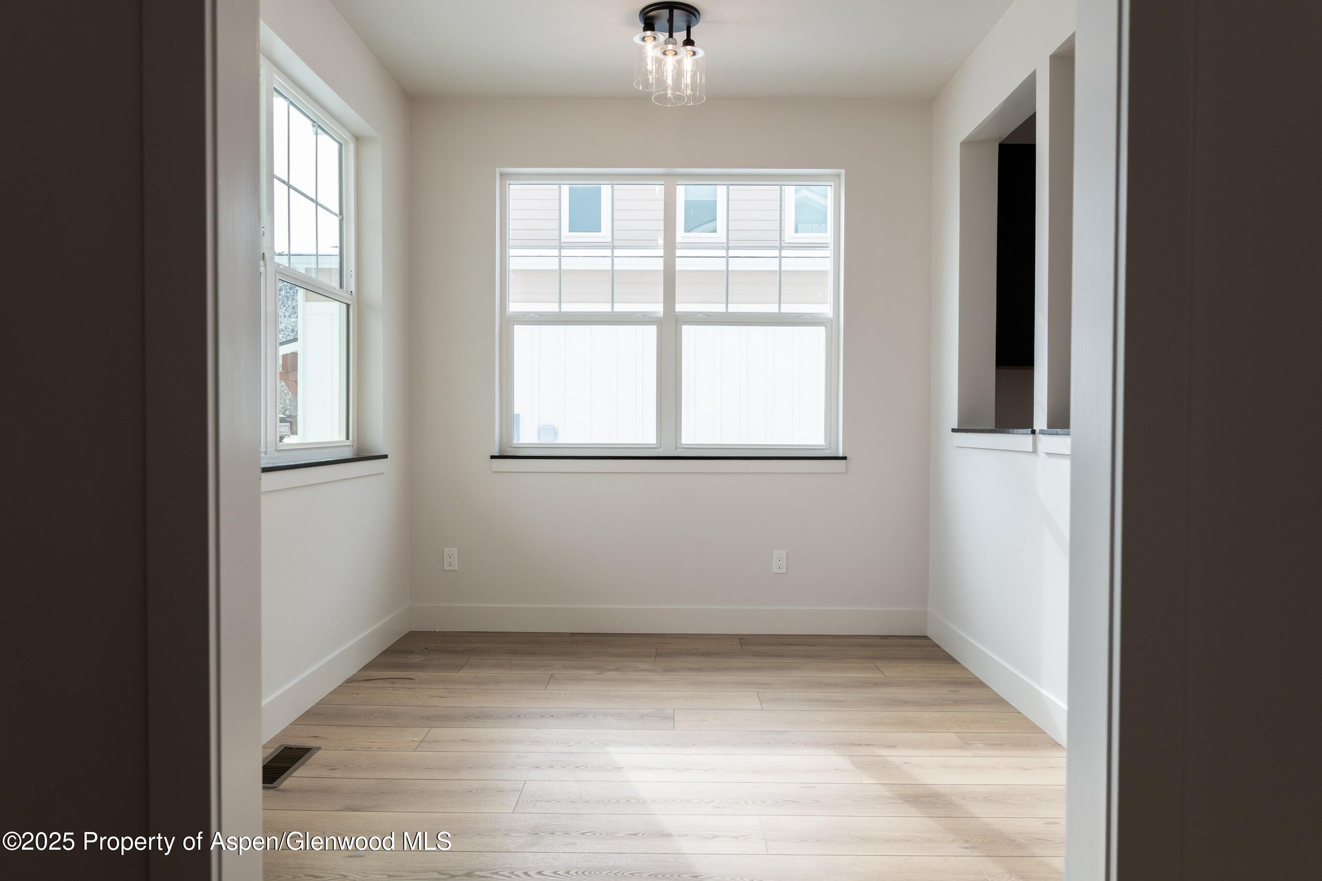 42 Mount Yale Court New Castle, CO 81647 - Photo 11 of 26 an empty room with a window