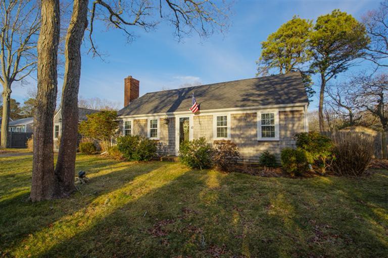 10 Goose Point Road Centerville, MA 02601 - Photo 1 of 30 a view of a house with a yard