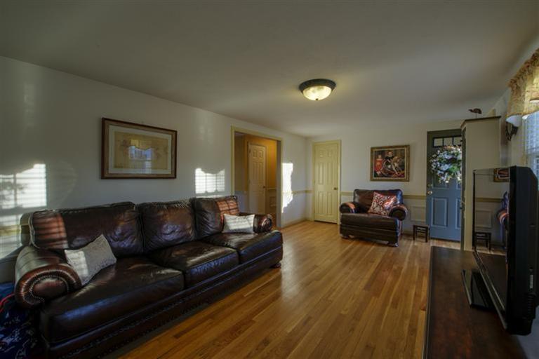10 Goose Point Road Centerville, MA 02601 - Photo 17 of 30 a living room with furniture and a flat screen tv