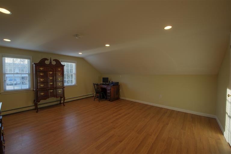10 Goose Point Road Centerville, MA 02601 - Photo 23 of 30 an empty room with furniture and wooden floor