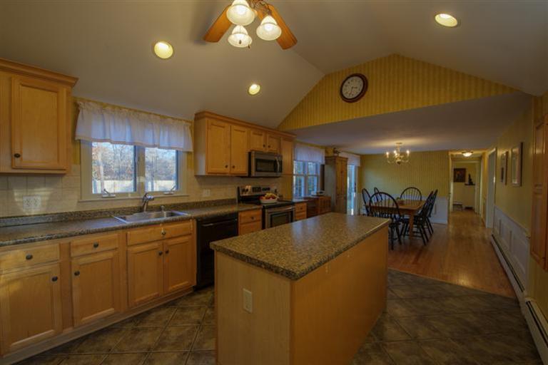 10 Goose Point Road Centerville, MA 02601 - Photo 6 of 30 a kitchen with a sink and cabinets