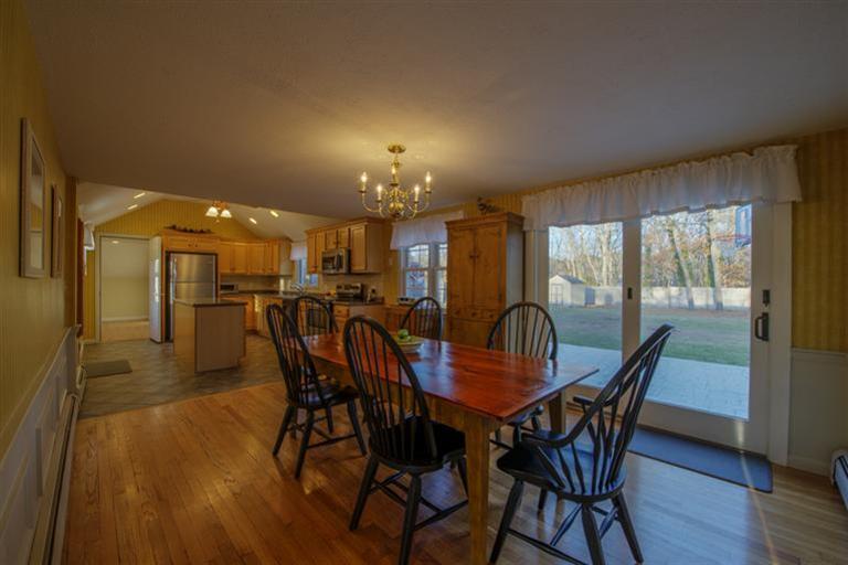 10 Goose Point Road Centerville, MA 02601 - Photo 9 of 30 a view of a dining room with furniture and wooden floor