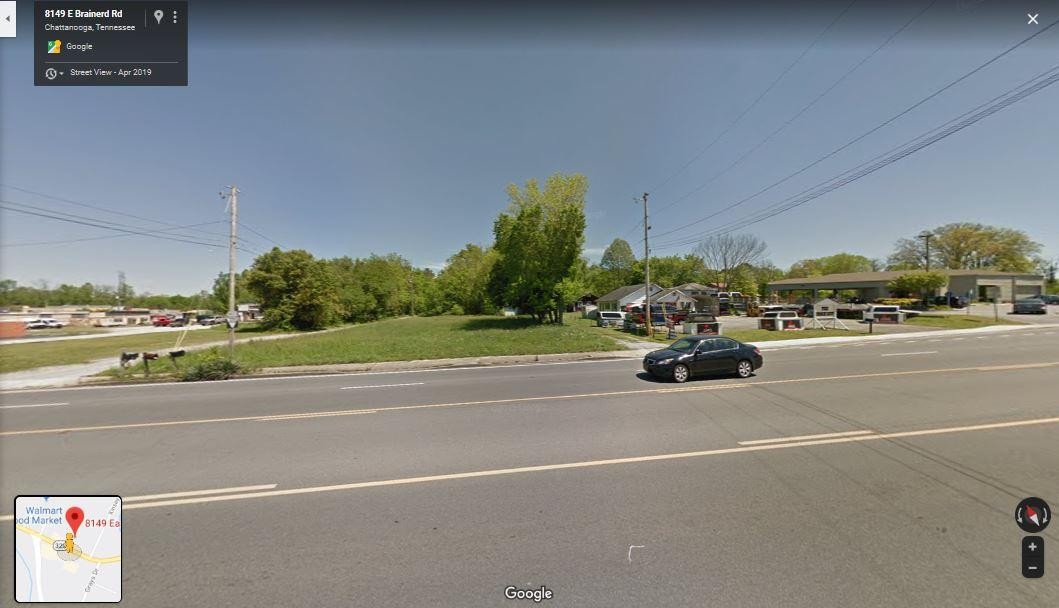 8149 East Brainerd Road Chattanooga, TN 37421 - Photo 8 of 23 a view of street with parked cars
