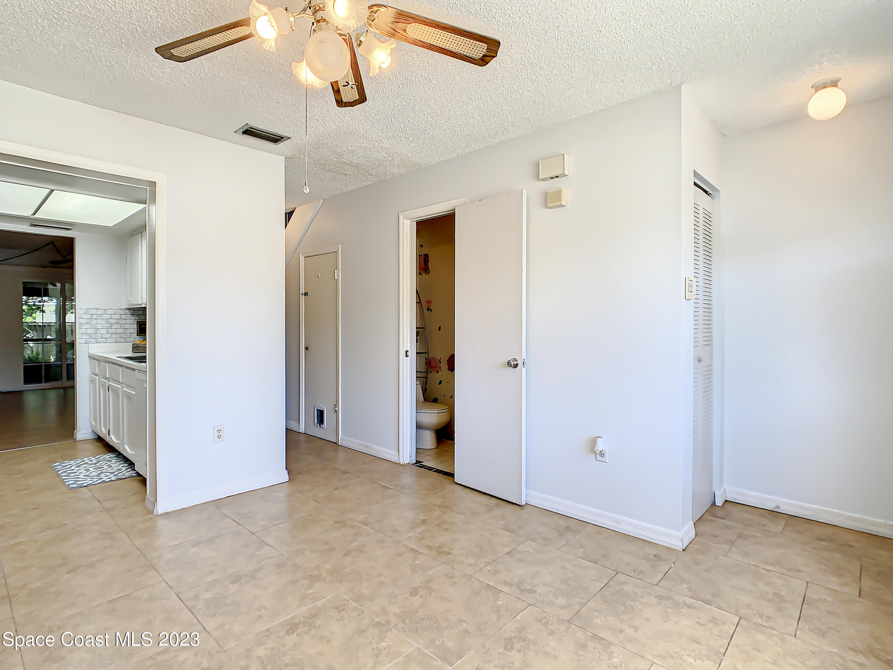 4859 Sisson Road Titusville, FL 32780 - Photo 12 of 30 a view of an empty room with a bathroom