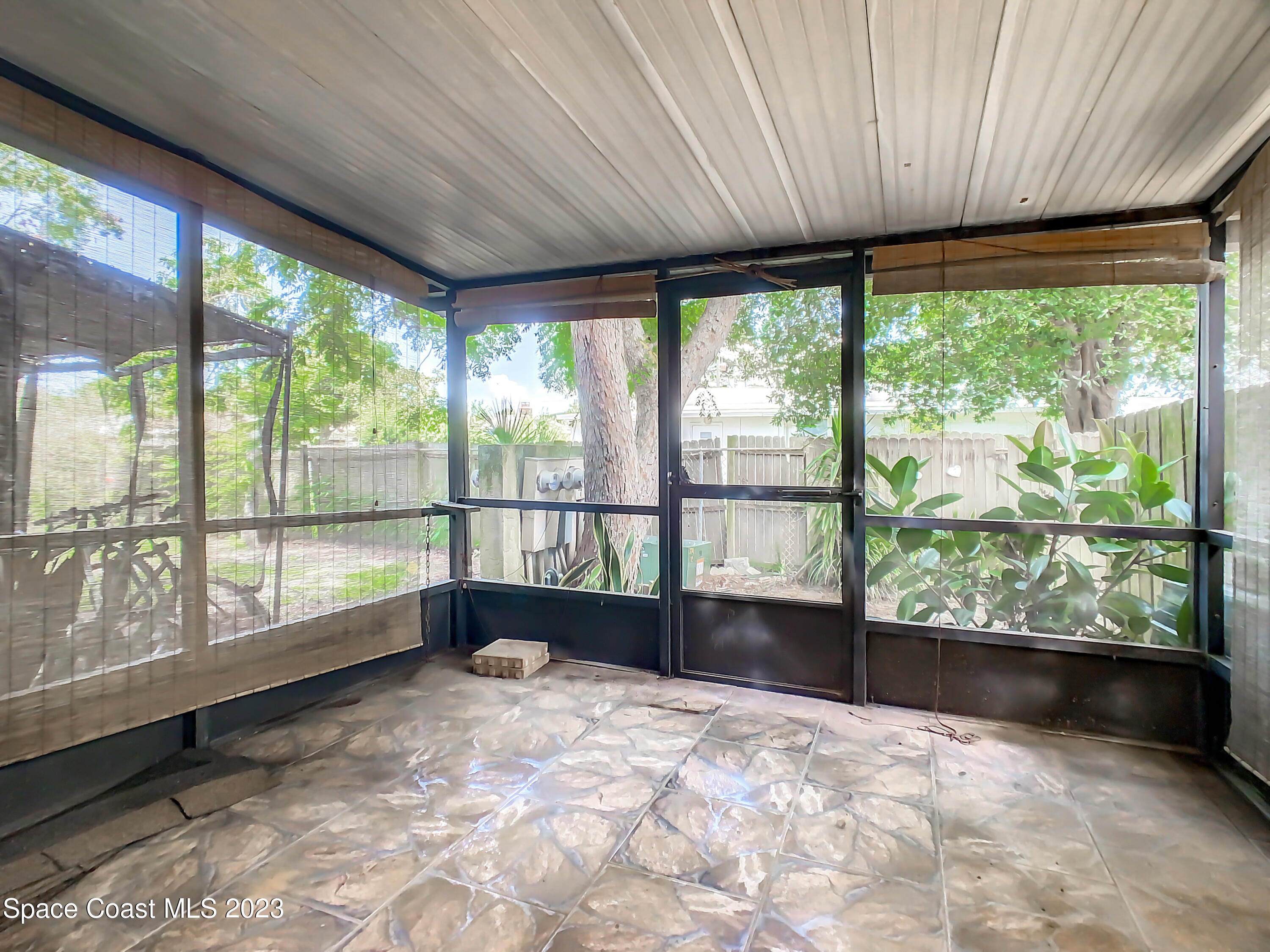 4859 Sisson Road Titusville, FL 32780 - Photo 26 of 30 a large white room with a large window