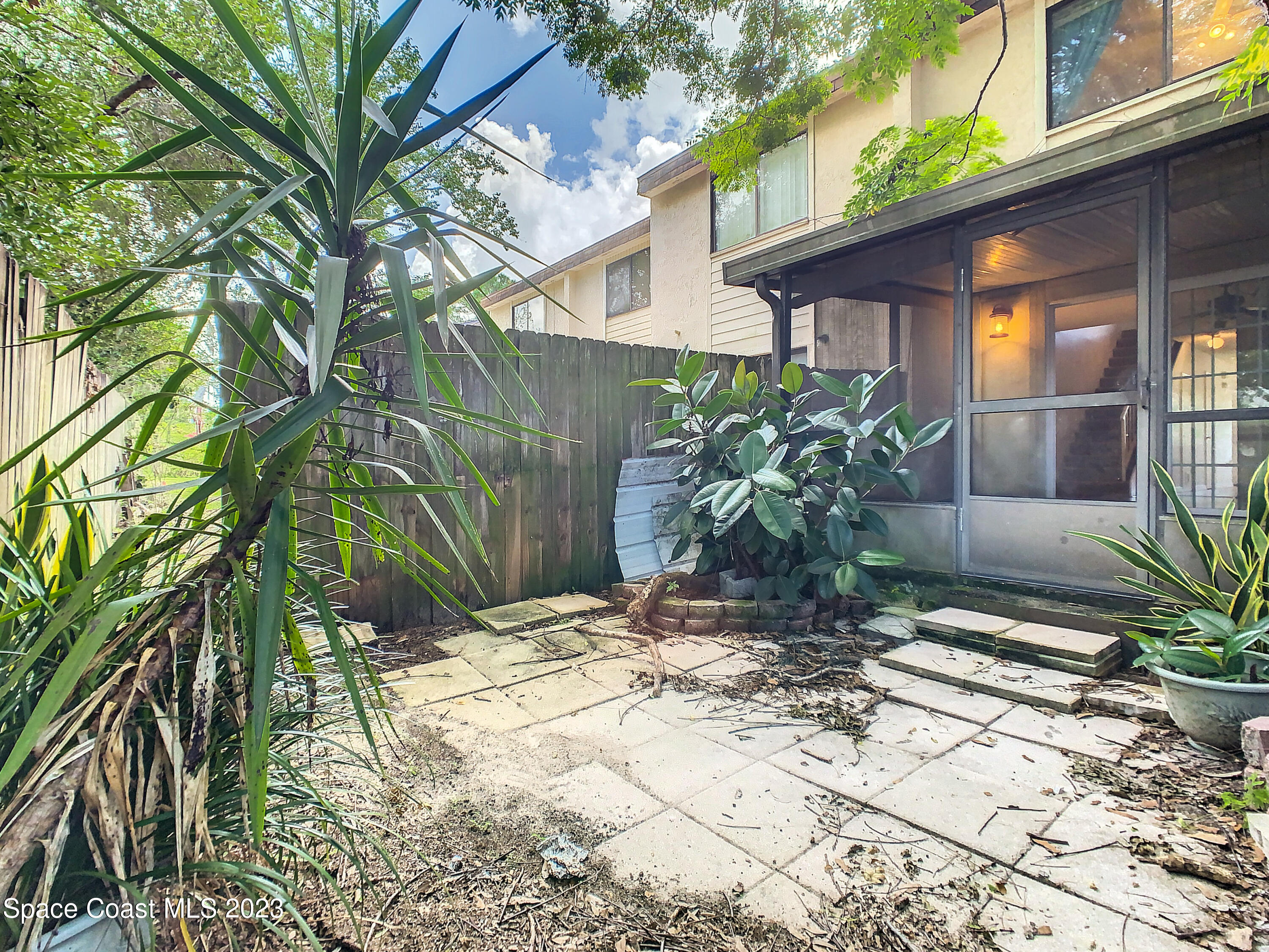 4859 Sisson Road Titusville, FL 32780 - Photo 27 of 30 a view of a house with a yard