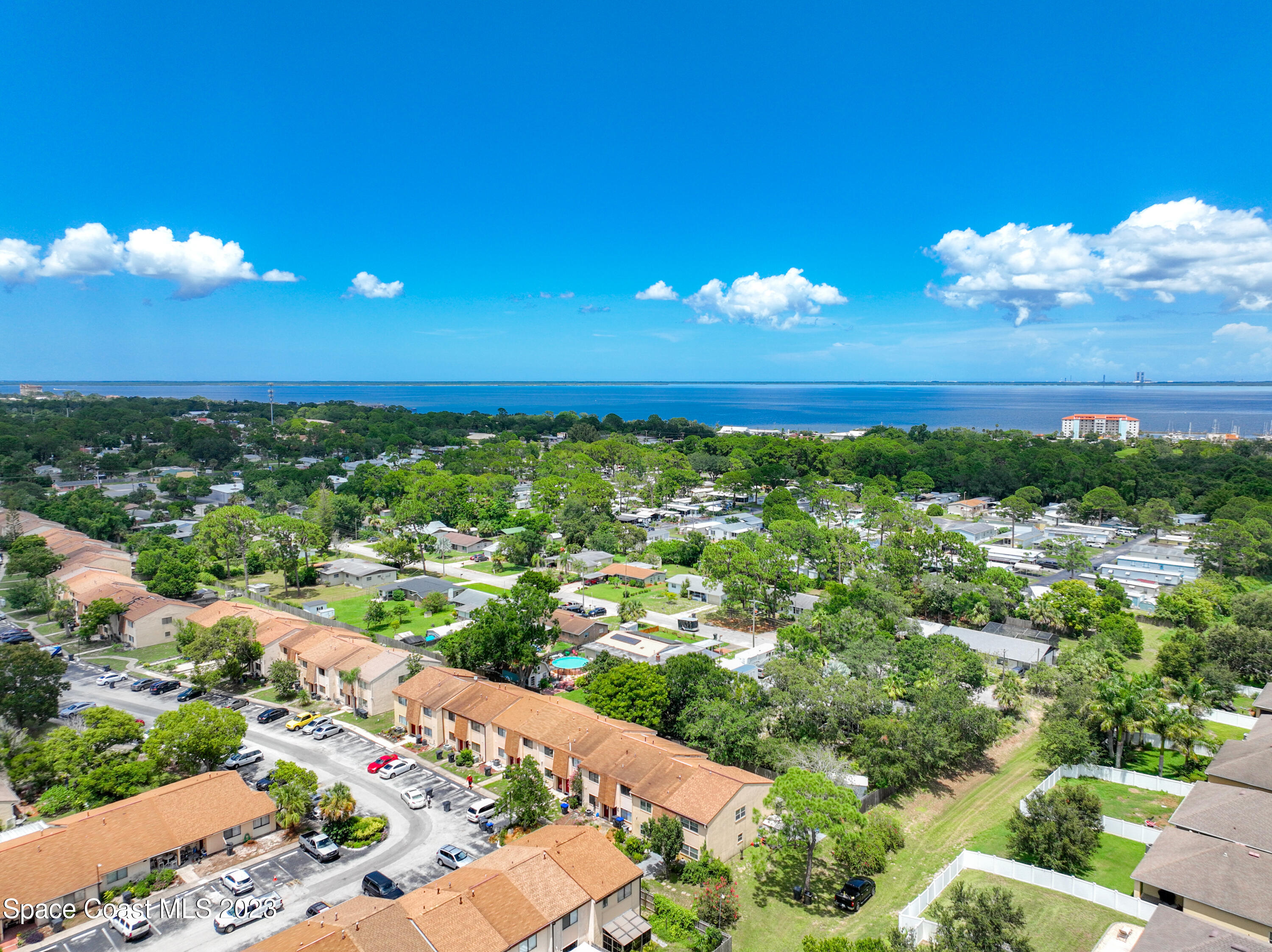 4859 Sisson Road Titusville, FL 32780 - Photo 30 of 30 a view of a city and an ocean