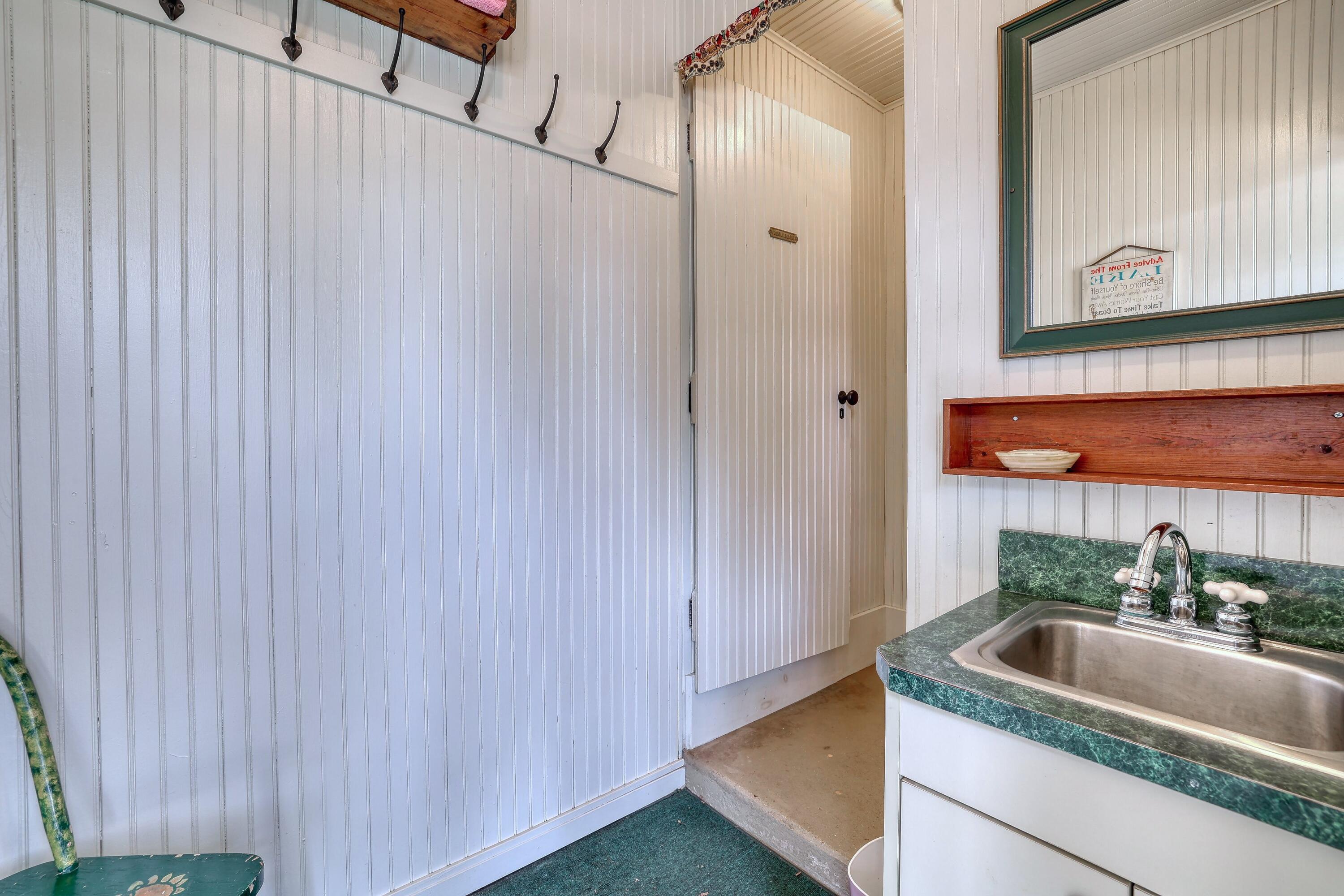 37909 Valley Road Summit, WI 53066 - Photo 51 of 62 Seasonal 1/2 bath is accessed from the outside in the garage area