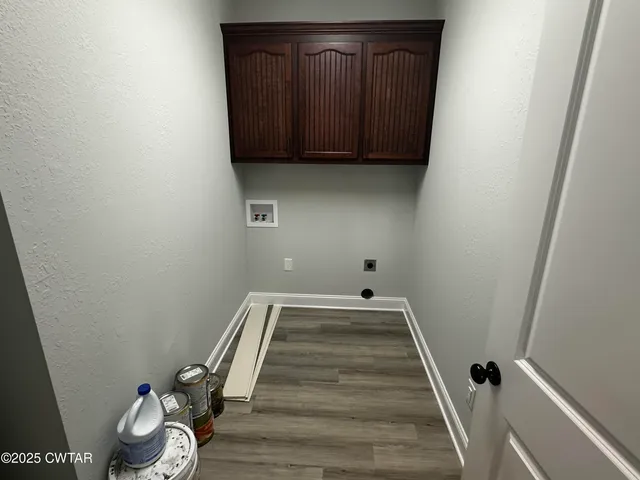 a view of small space with wooden floor