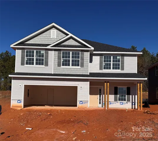 a view of a backyard of a house