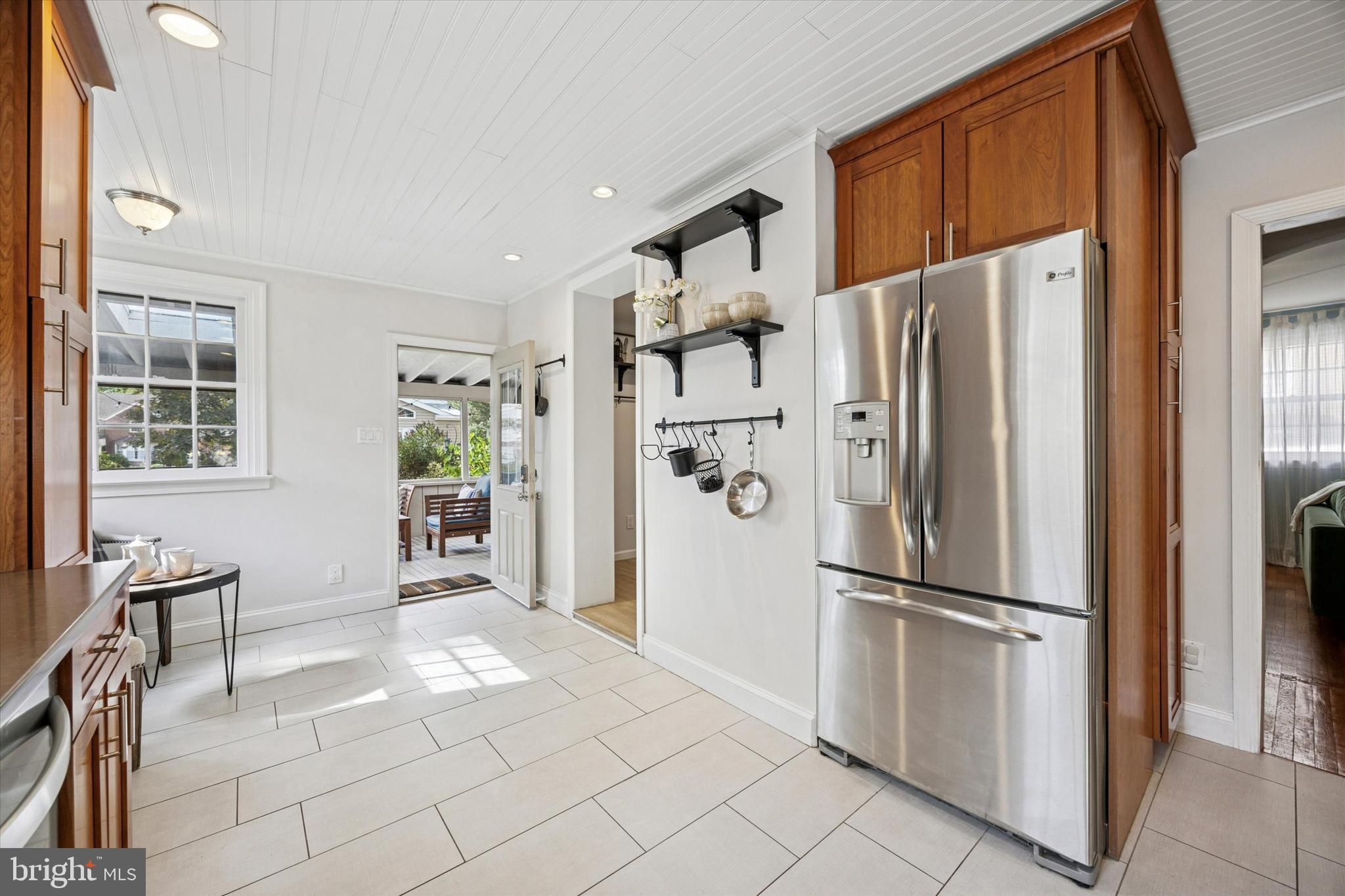 1612 Earlington Road Havertown, PA 19083 - Photo 12 of 35 a metallic refrigerator freezer sitting in a kitchen