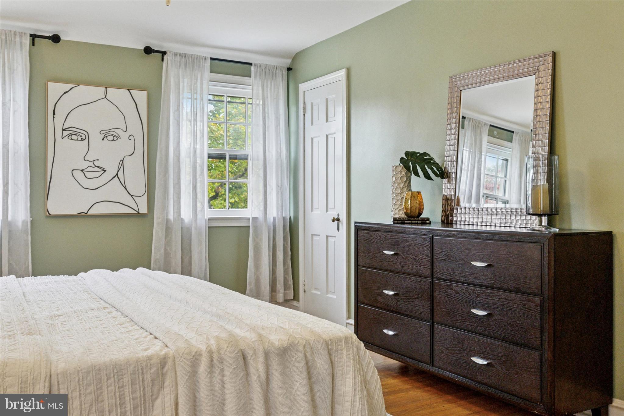 1612 Earlington Road Havertown, PA 19083 - Photo 16 of 35 a bedroom with a bed and a dresser