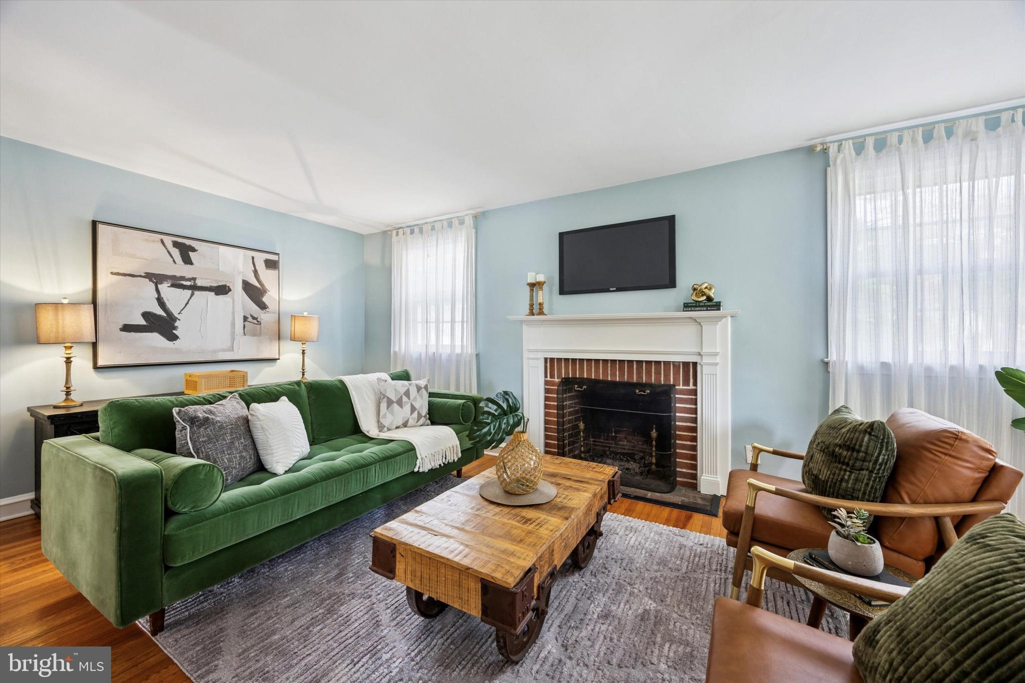 1612 Earlington Road Havertown, PA 19083 - Photo 3 of 35 a living room with furniture and a fireplace