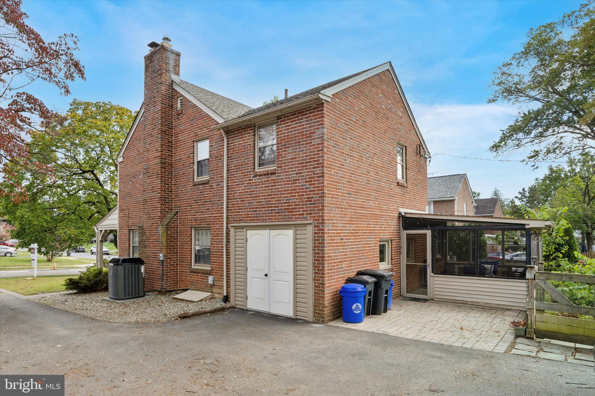 1612 Earlington Road Havertown, PA 19083 - Photo 31 of 35 a view of a house with a yard and garage