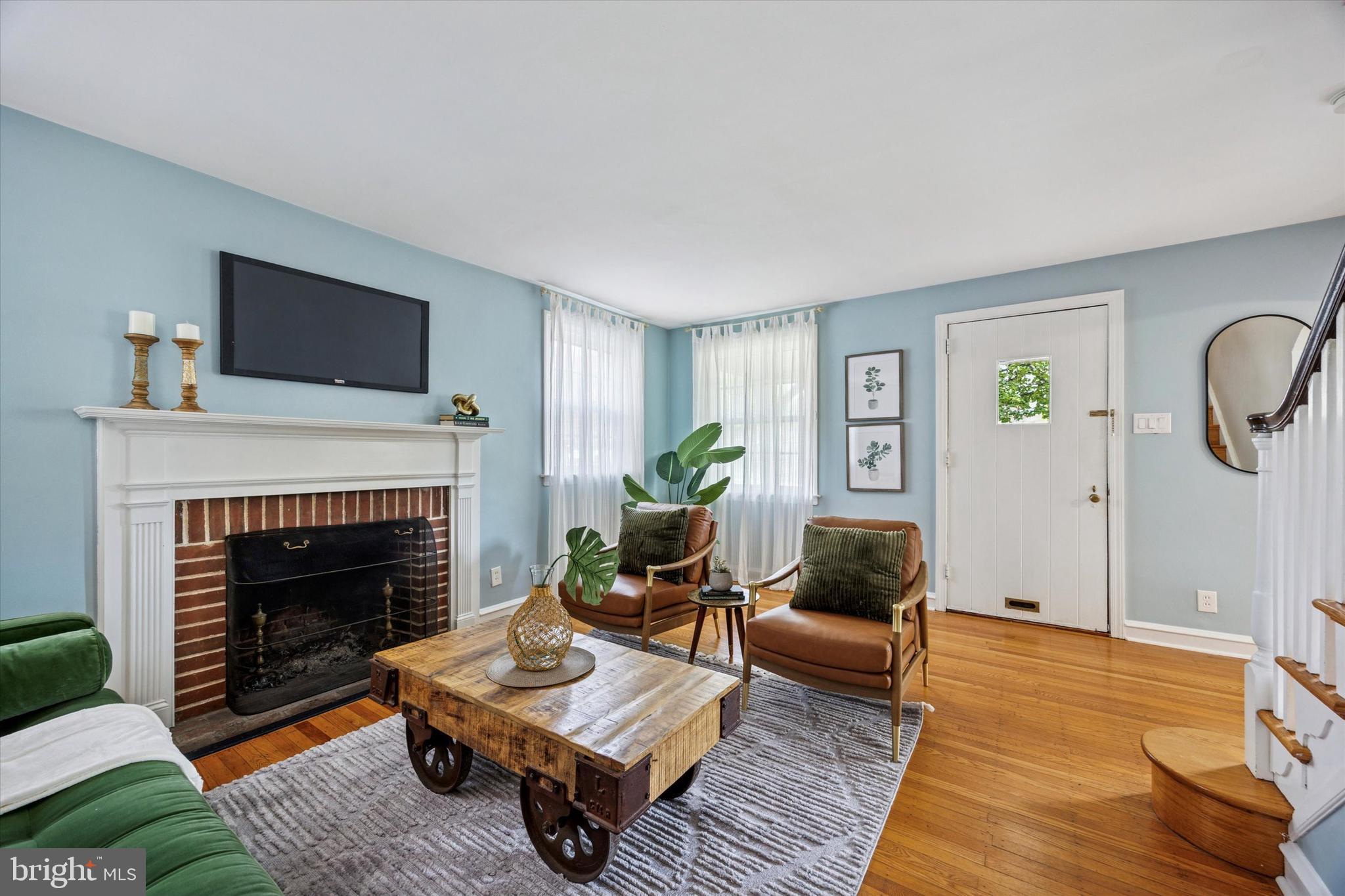 1612 Earlington Road Havertown, PA 19083 - Photo 4 of 35 a living room with furniture and a fireplace
