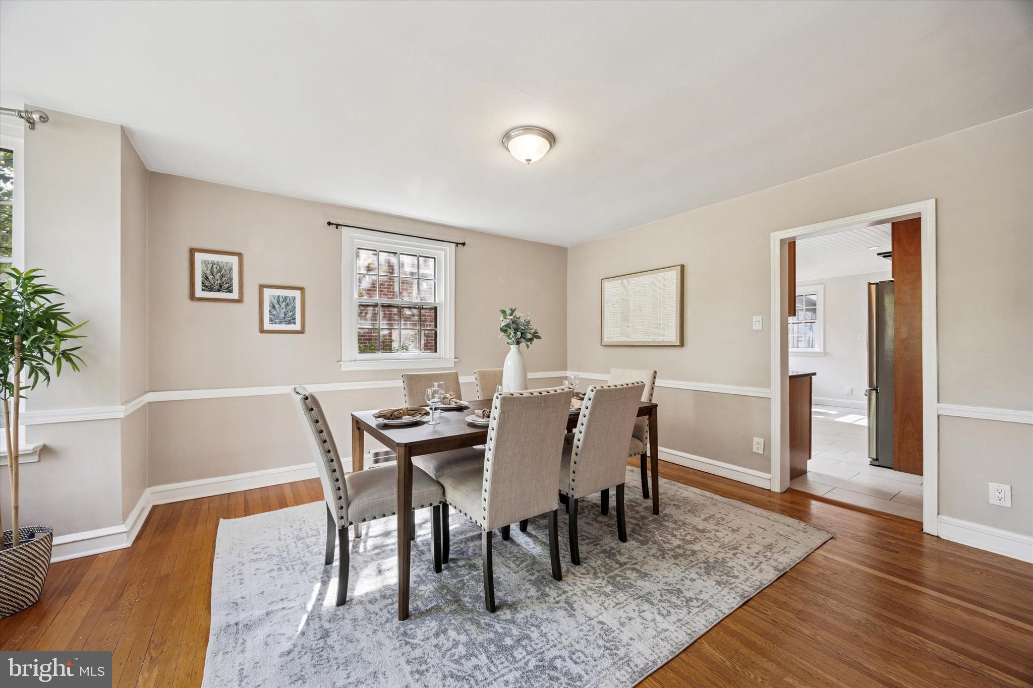 1612 Earlington Road Havertown, PA 19083 - Photo 5 of 35 a view of a dining room with furniture and wooden floor