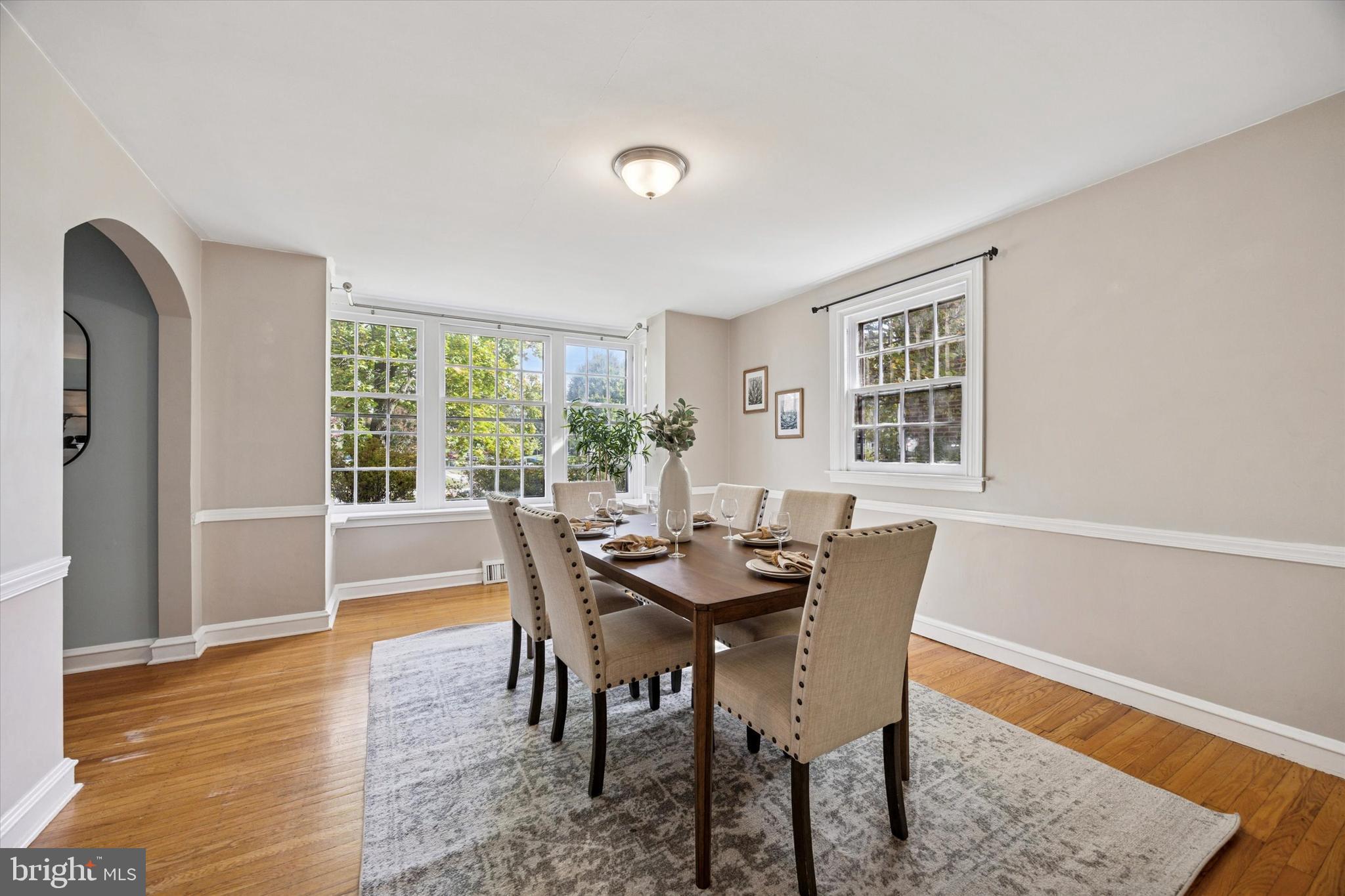 1612 Earlington Road Havertown, PA 19083 - Photo 6 of 35 a dining room with furniture and wooden floor