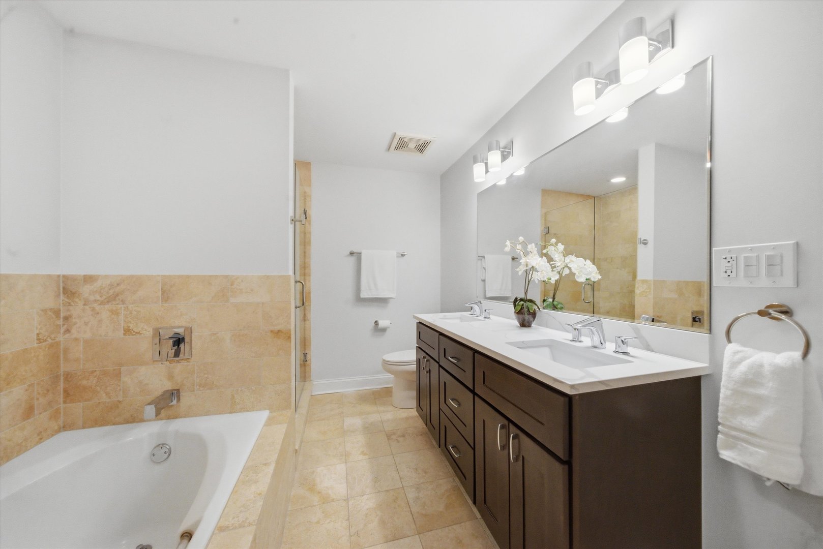 1610 South Halsted Street, Unit 401 Chicago, IL 60608 - Photo 13 of 31 a bathroom with a tub sink and mirror