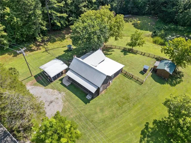 a view of a yard with swimming pool