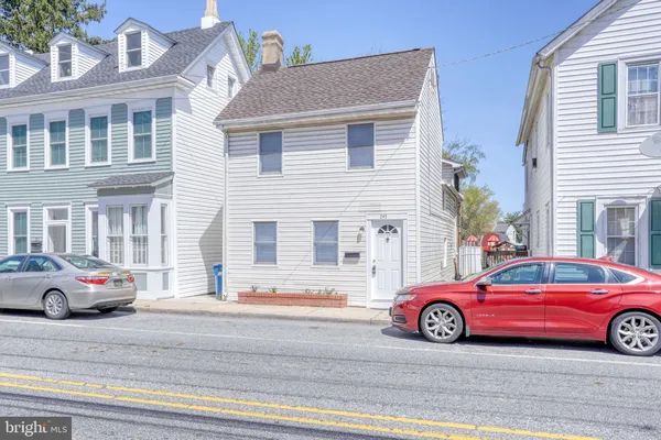 a car parked in front of a house