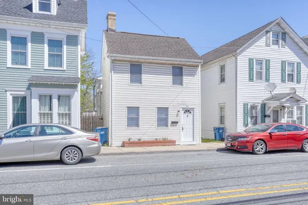 a car parked in front of a house