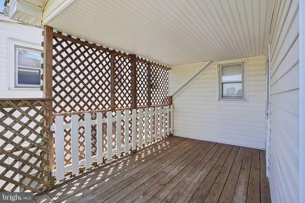 a view of outdoor space with wooden deck