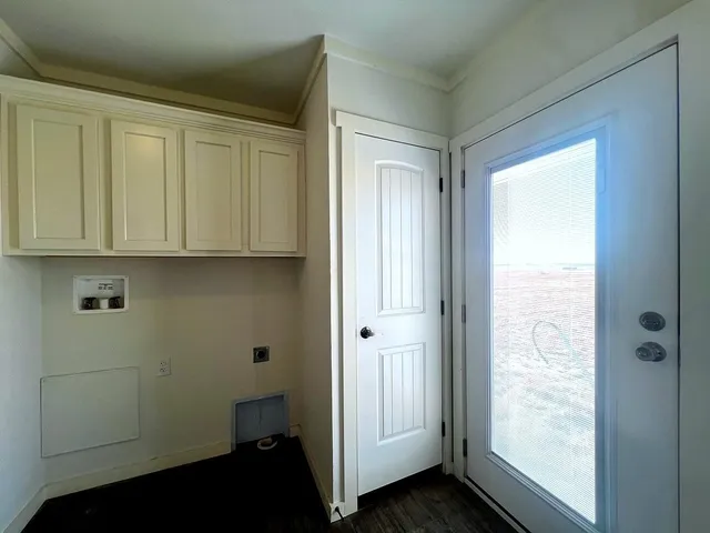 a view of hallway with washer and dryer
