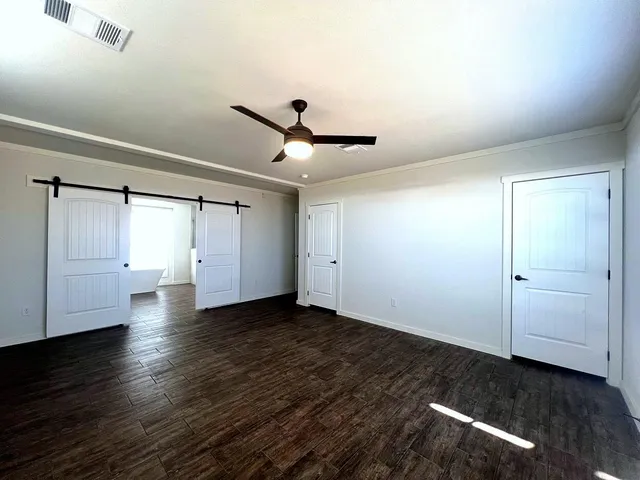 a bathroom with a double vanity sink and a window