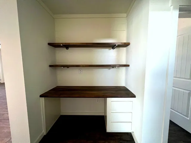 a bathroom with a sink and mirror