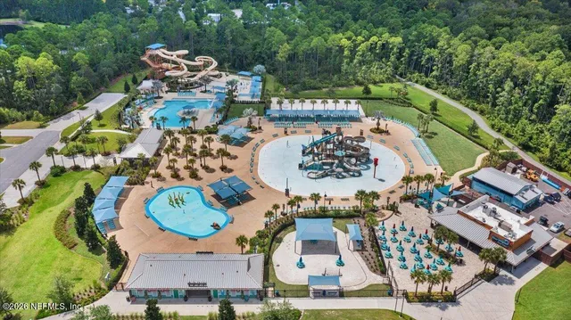 an aerial view of a and an chairs