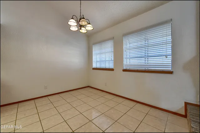 a view of room with ceiling fan