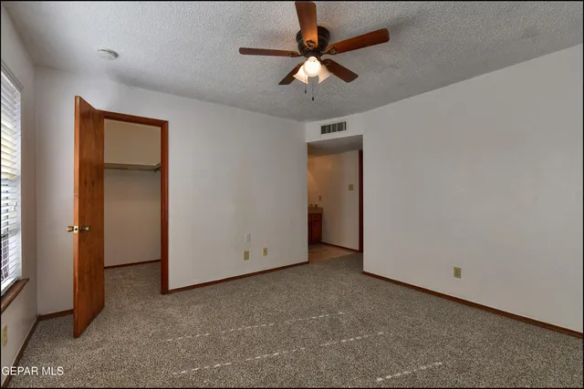 a view of a building with a yard