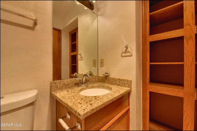 an aerial view of a houses with yard