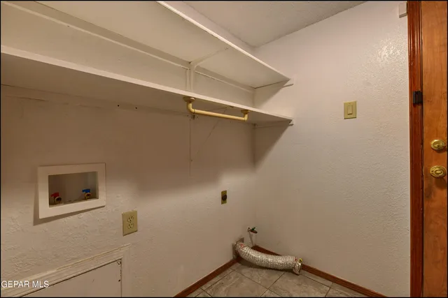 an aerial view of a house with outdoor space