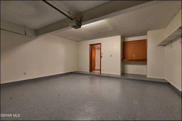 an aerial view of a house with a garden